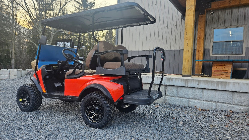 2024 MADJAX X-Series Storm Lithium - 4 Passenger Lifted - Vivid Orange 3404 *SOLD*