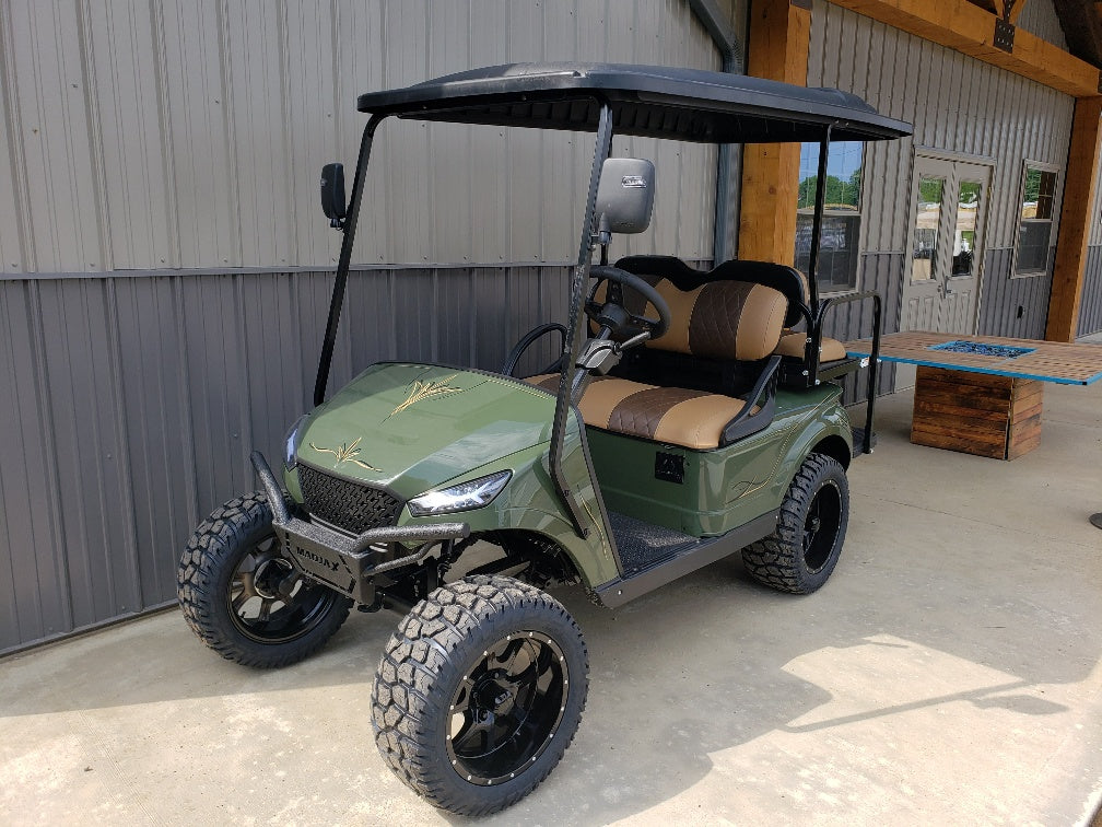 EZGO TXT ELECTRIC 48V CUSTOM GOLF CART - FOREST GREEN STORM *SOLD*