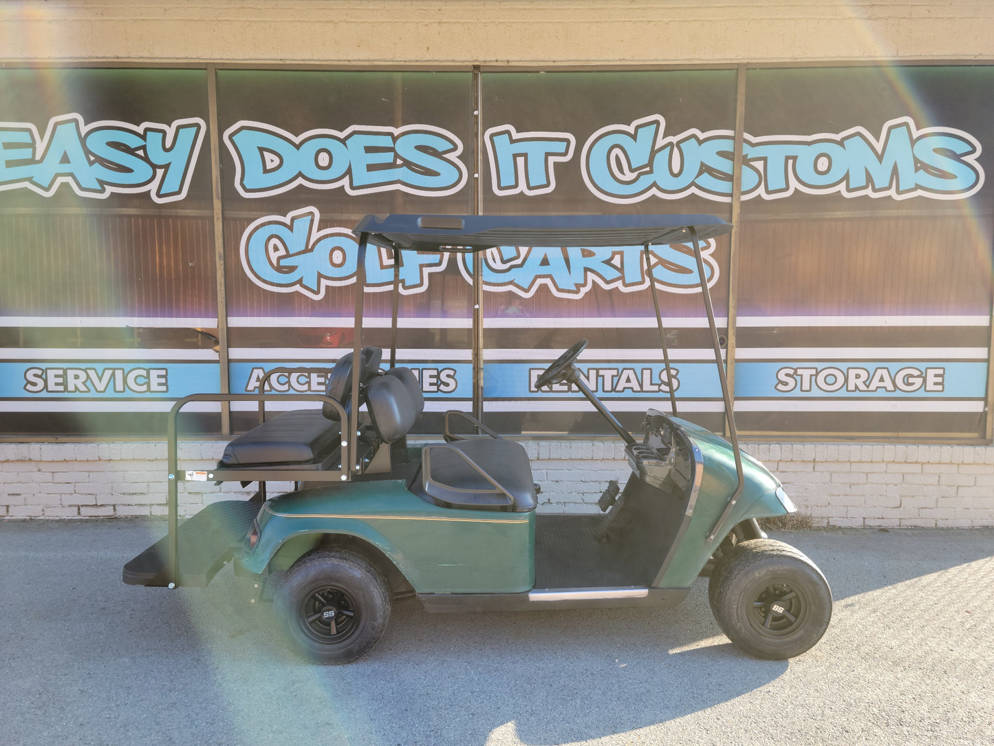 Gas EZGO TXT Golf Cart with black seats and dash SOLD