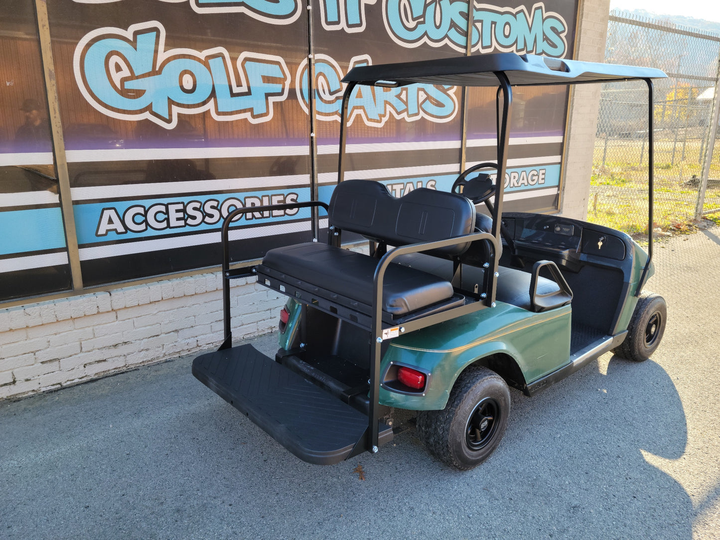 Gas EZGO TXT Golf Cart with black seats and dash SOLD